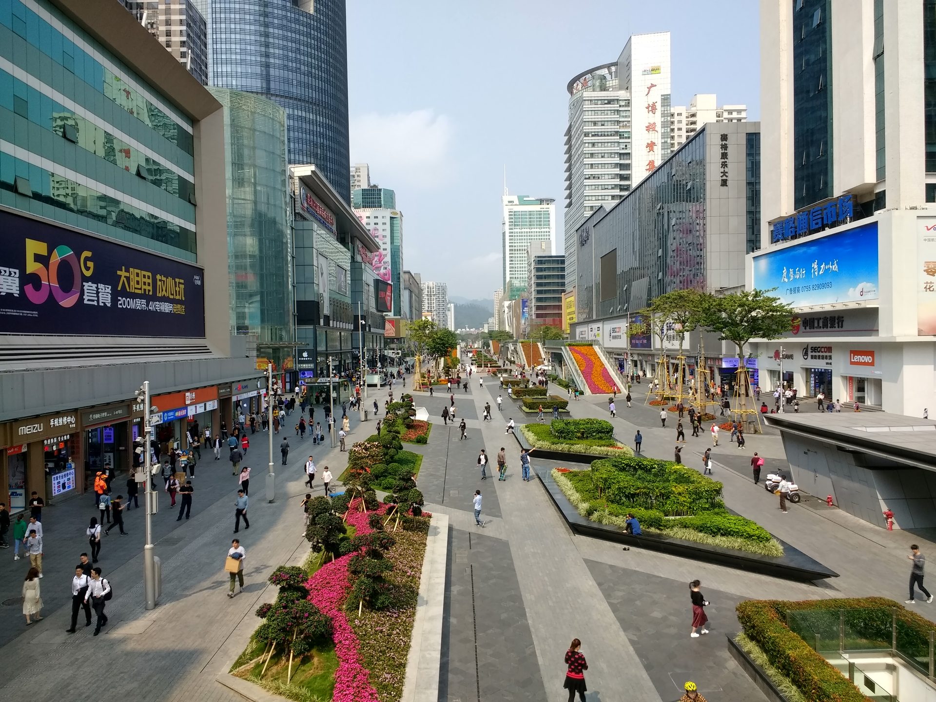 Huaqiangbei pedestrian street in Shenzhen seen from above: electronics malls and 5G billboards on both sides