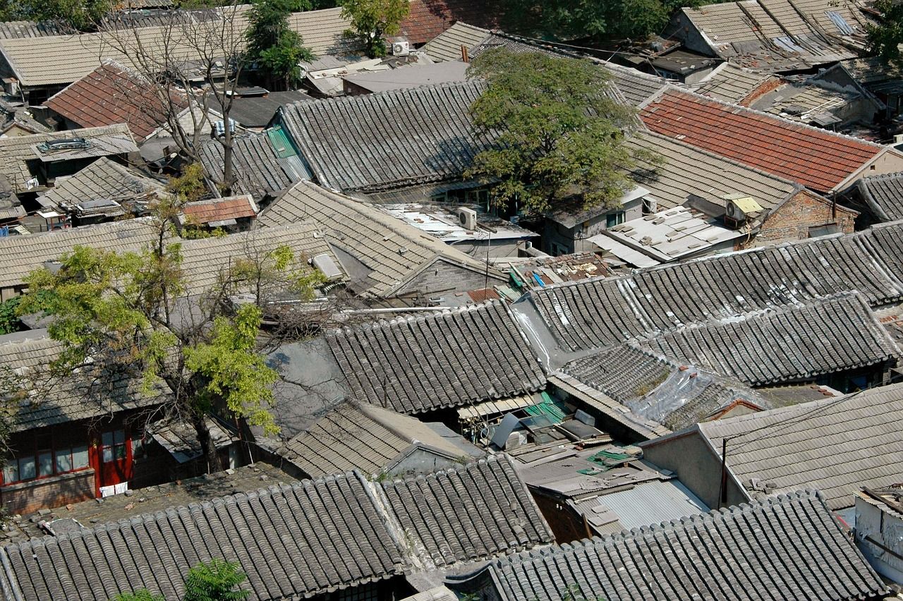 A grey-walled hutong alley in old Beijing