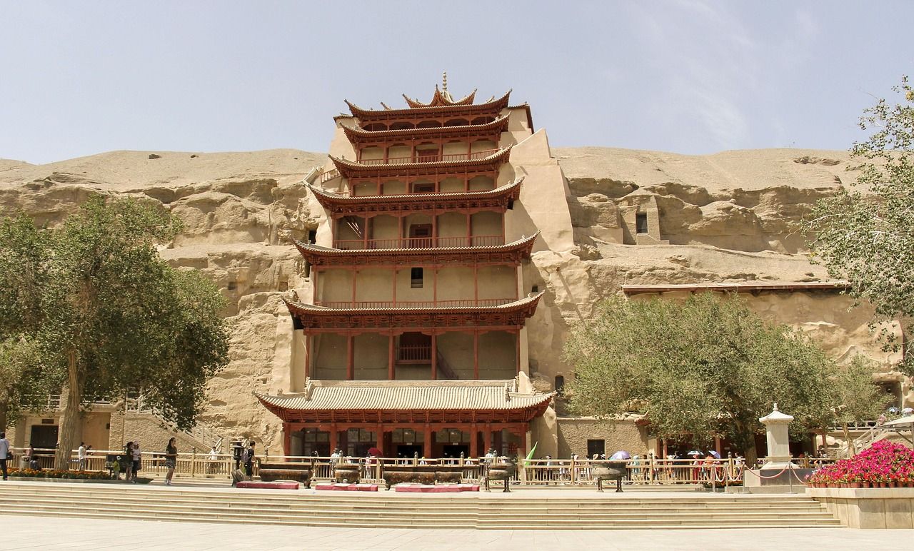 The cliff face of the Mogao Caves near Dunhuang, with the Nine-Storey pavilion