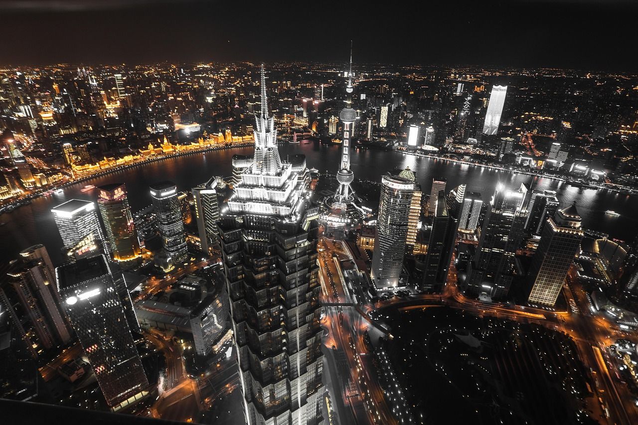 Nanjing Road after dark — the backbone of most evening walks